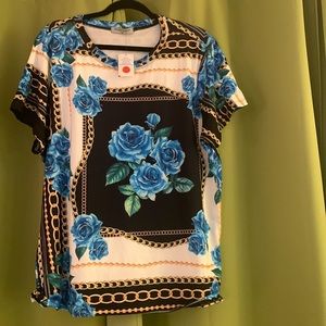 Pretty Royal blue floral pattern with white background brand new never worn.